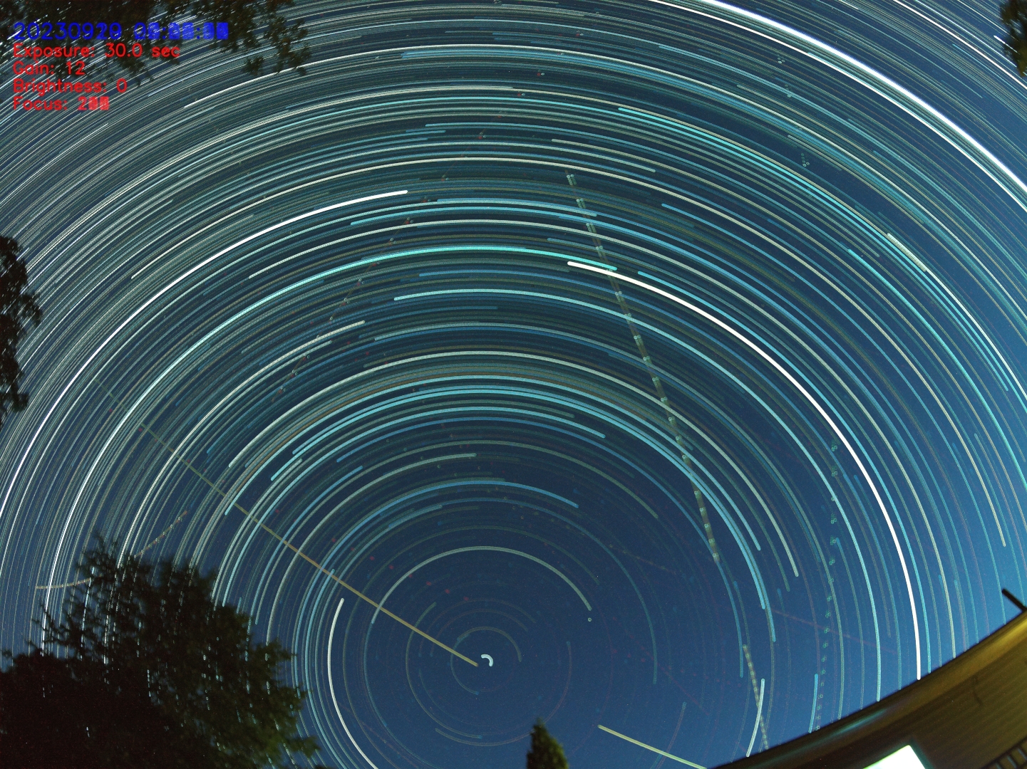 A circular light trails in the sky

Description automatically generated with medium confidence